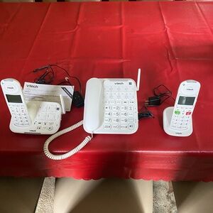 Vtech cordless phone with answering machine and corded phone with extra cordless